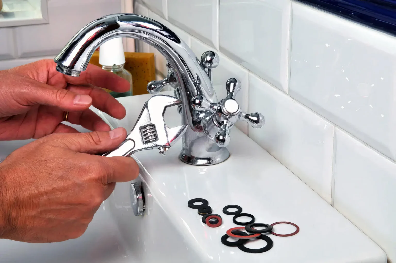 Plumber maintaining a bathroom faucet in Lawndale