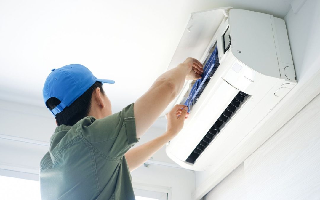 HVAC technician servicing a ductless mini split in Lawndale